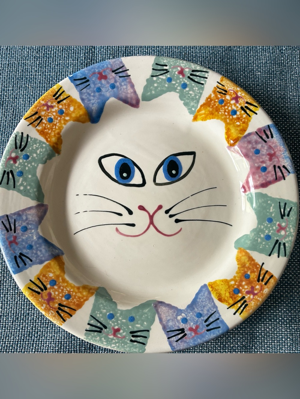 Sari Pottery, folk art and whimsical designs plate.